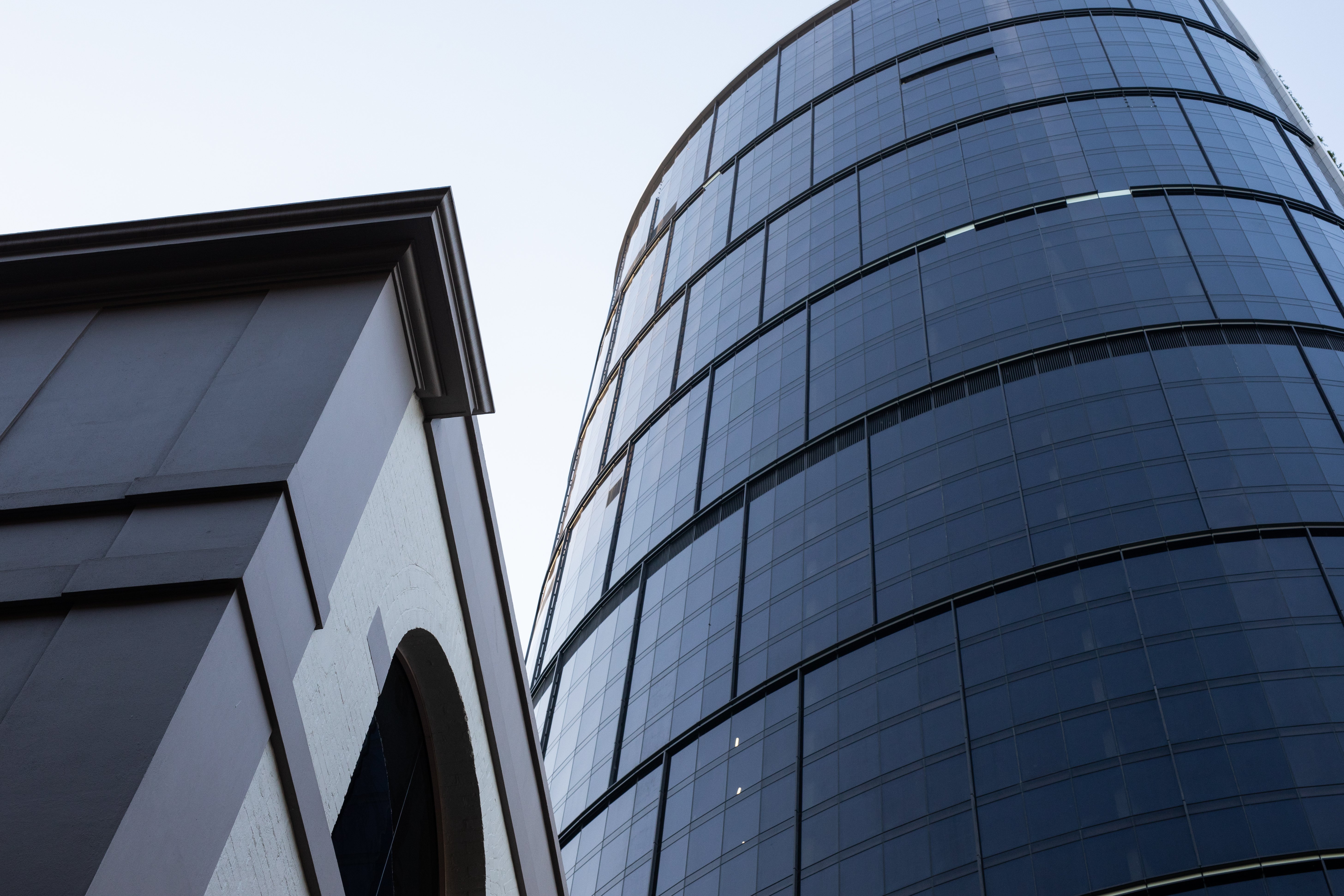 tall-office-towers-commercial-real-estate-blue-sky-2025-02-21-21-43-40-utc